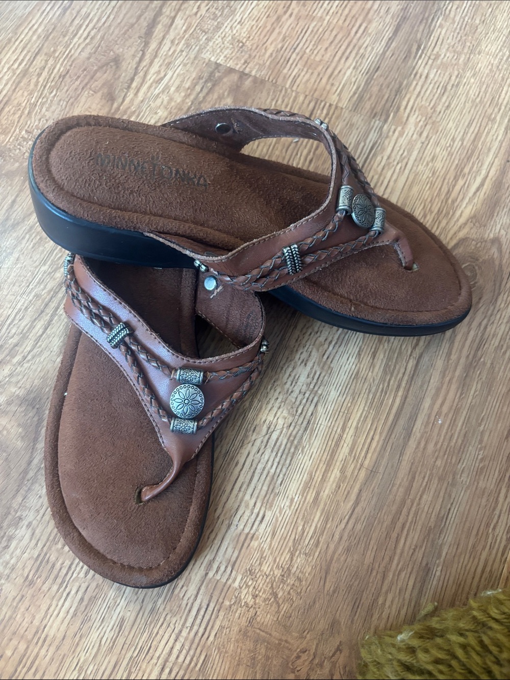 Minnetonka Brown Braided Leather Thong Sandals with Metal Accents